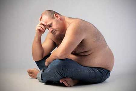 Мужчина с лишним весом Мужчина с лишним весом