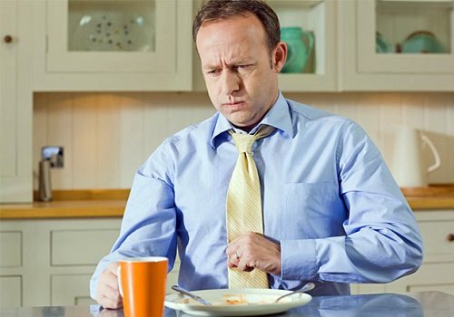 Тяжесть в желудке после еды